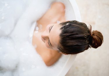 Beautiful woman taking a bath