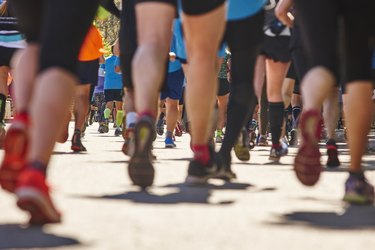 Marathon runners on the street using running for weight loss