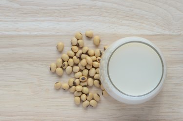 Fresh Soy milk in a glass and soybean seeds