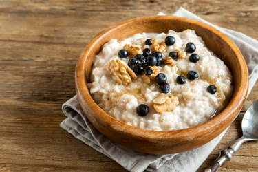 Top view of oatmeal with blueberries as an example of the best foods for hiatal hernia