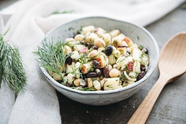 Bean salad, with black beans, chickpea, apple, spring onion and dill