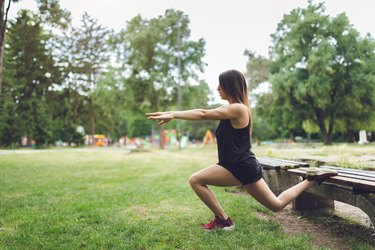 Woman exercising in a public park