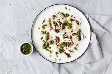 Mushroom carpaccio with basil pesto and parmesan