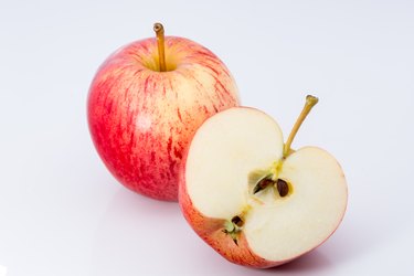 Close-Up Of Fresh Apples On White Background