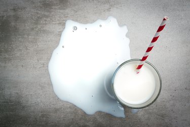 Glass of milk on a concrete table