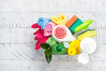 Top view of a bucket of cleaning supplies