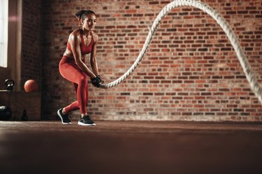 Woman doing cross training routine