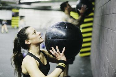 Young woman in high intensity fitness session.