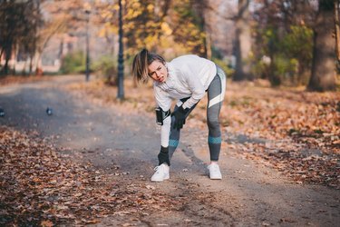 Sportswoman with sprained ankle