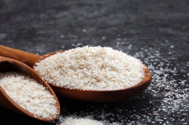 Portion of Psyllium Seeds on rustic dark background. Psyllium seed husks