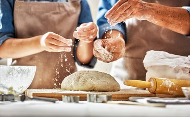 people making dough with low carb flour for keto baking