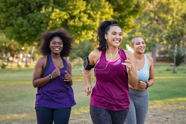 Active curvy women jogging