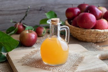 A bottle of raw unfiltered apple cider vinegar