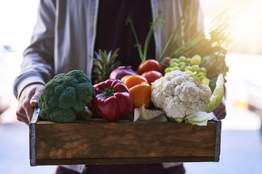 Fruit and vegetables in wooden box