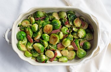 Overhead shot of sauteed Brussels sprouts in a vegetable dish.