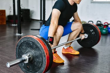 Bodybuilder weightlifting in the gym