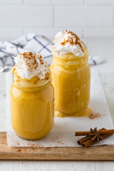 Pumpkin pie spice protein smoothie on table