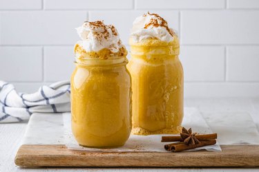 pumpkin spice smoothies in two mason jars
