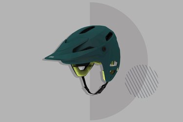 green Giro Tyrant Spherical Helmet on gray background