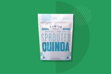 A bag of Thrive Market's Sprouted Quinoa depicted on a green background