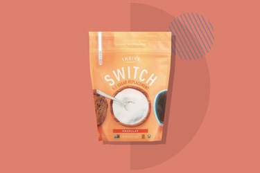 A bag of Thrive Market Switch 1:1 Sugar Replacement displayed on a salmon background