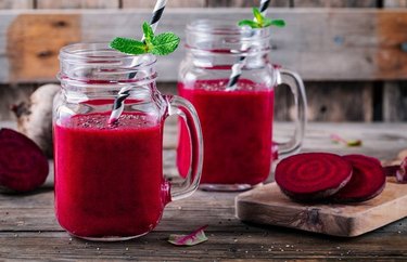 red Beet Smoothie on wooden board