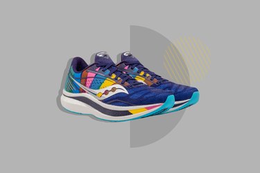 Pair of men's Saucony running shoes against a grey background