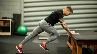 Move 3: Elevated High Plank With Alternating Knee
