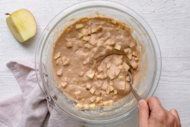 Batter with apples mixed in