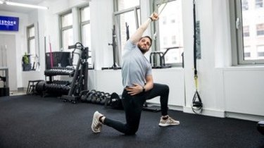 Move 1: Overhead Banded Lat Stretch