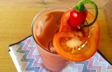 Anti-inflammatory Drink Bloody Mary Kava in glass with tomato slice and jalapeno pepper