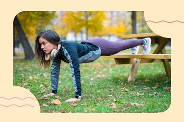 woman doing decline push-up variation on picnic table bench outside