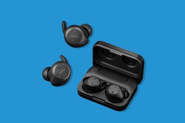 Black Jabra Elite Sport Wireless Earbuds on a Blue Background