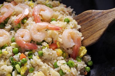 One-pot dinner of shrimp and rice with vegeteables.