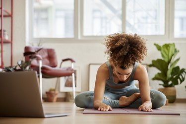 Person stretching after a workout at home