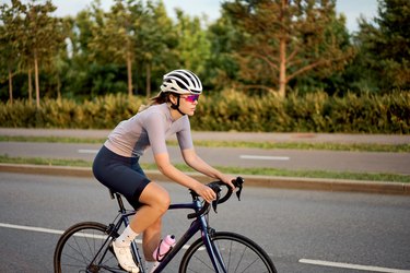 Person riding on a road bike outdoors