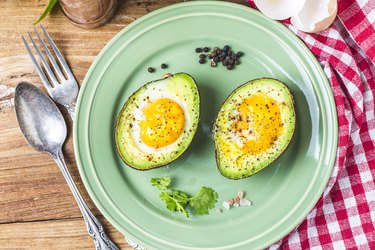 Homemade Organic Egg Baked in Avocado with Salt and Pepper