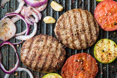 hamburger patties on the grill