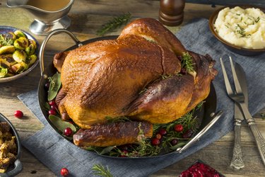 Organic Homemade Healthy Smoked Turkey Dinner for Thanksgiving on a Table