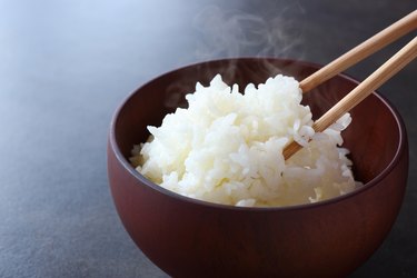 japanese rice on black background, as an example of foods bad for brain health