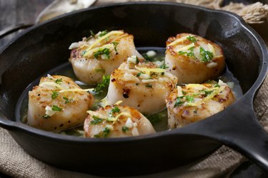 Scallops Poached in a Butter and Garlic Sauce