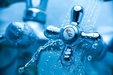 close view of a cold tap, to represent taking a cold shower for weight loss