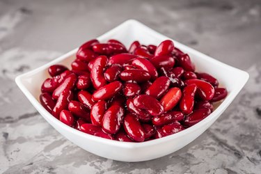 canned red kidney beans on a dark stone rustic background