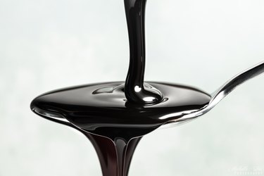 Pouring Molasses on a Spoon