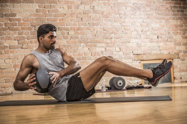 Medicine Ball Ab Workout: Russian Twist, Plank, Crunch, and More