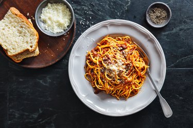 Spaghetti alla bolognese in a white dish for spaghetti pasta diet