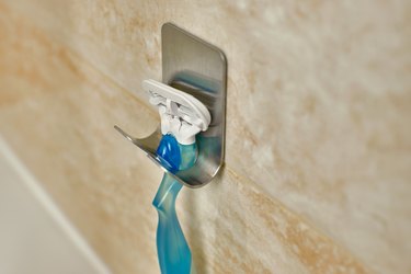 a razor on a shower shelf, to represent what causes an ingrown pubic hair