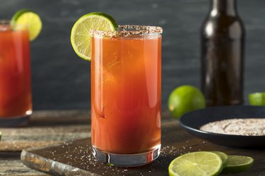 A glass of tomato juice with lime, as an example of foods to avoid with GERD