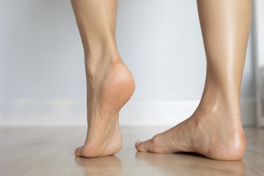 Barefoot heels on a wood floor