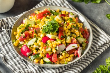 Healthy Homemade Sweet Corn Salad with raw corn in bowl